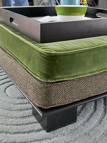Fabric covered ottoman