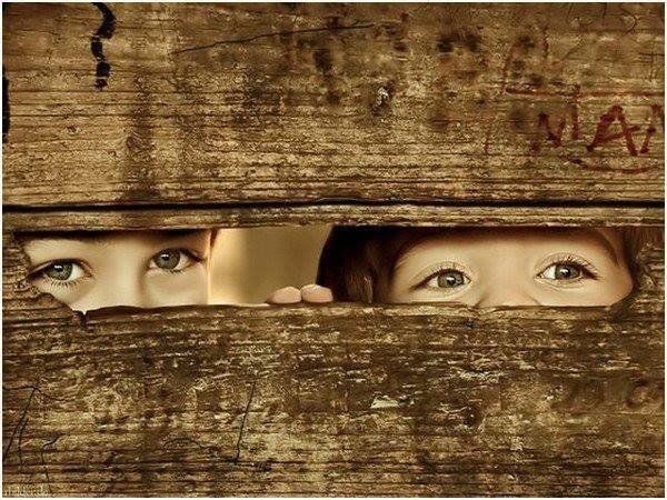 Kids Peeking Through Fence Kids Peeking Through Fence