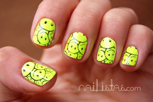 Neon green smiley face nails Neon green smiley face nails