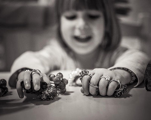 Playing in mommy's jewelry