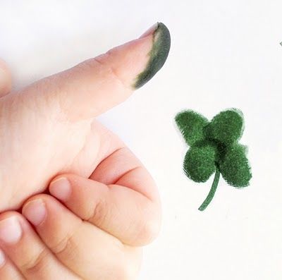 Thumb print four leaf clovers