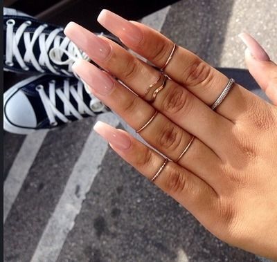 Pink manicure and rings Pink manicure and rings
