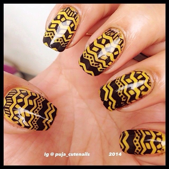 Yellow and black aztec nails Yellow and black aztec nails