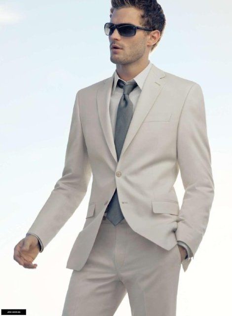 Light themed suit and sunglasses Light themed suit and sunglasses