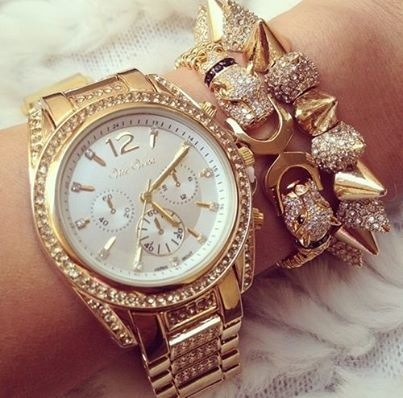 Gold diamond watch and bracelets