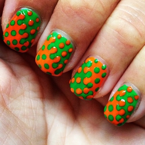 Orange and green splatter nails