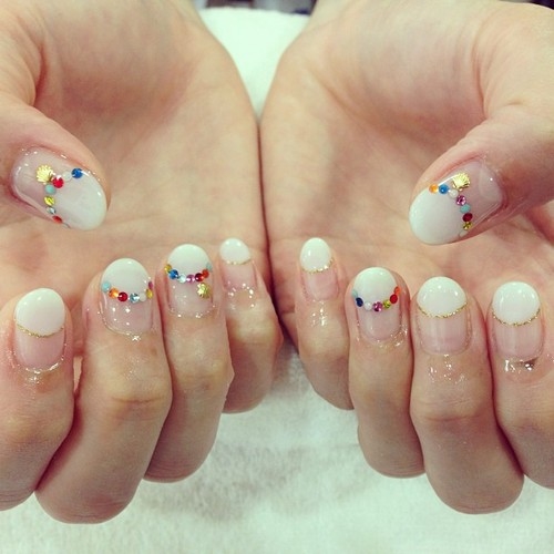 French tip colorful stud nails French tip colorful stud nails