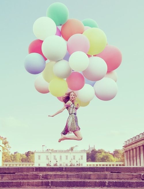 floating with balloons