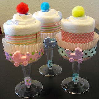 Champagne diaper cupcakes pompom