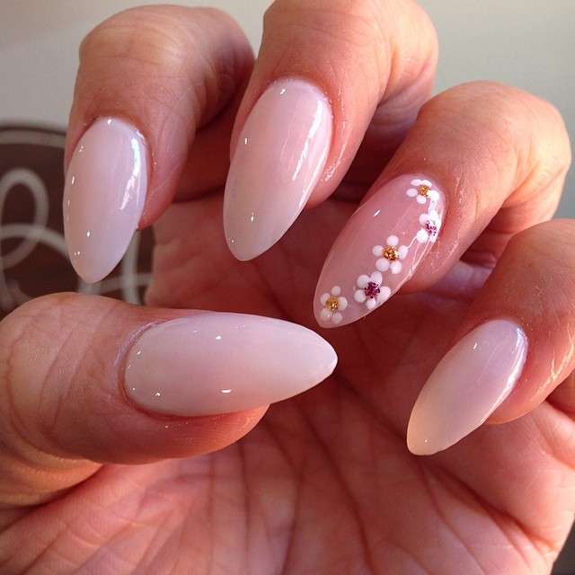 Nude floral stiletto nails Nude floral stiletto nails
