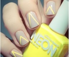 Neon yellow triangle nails