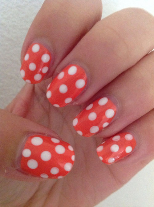 Orange polka dot nails