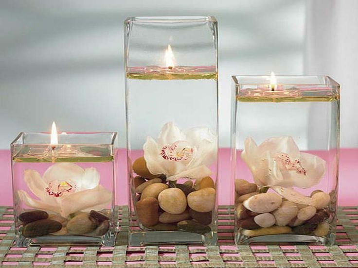 Flowers in Glass Candle Holders