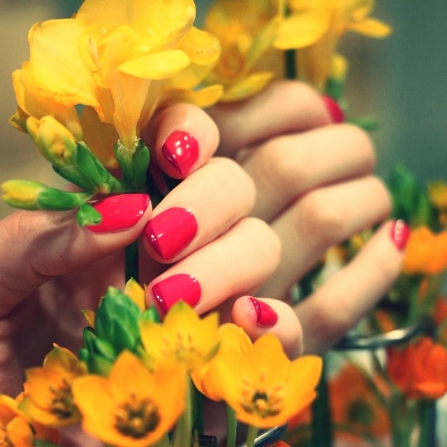Hot pink nails and flowers