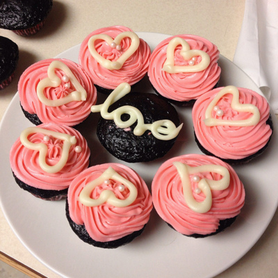 Chocolate cupcakes with pink frosting Chocolate cupcakes with pink frosting