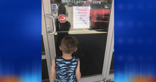 7-Year-Old Boy Tries To Enter A Clothing Store, But Stops. Then His Mother Reads The Sign And Realizes It's Time To Leave - picture 2