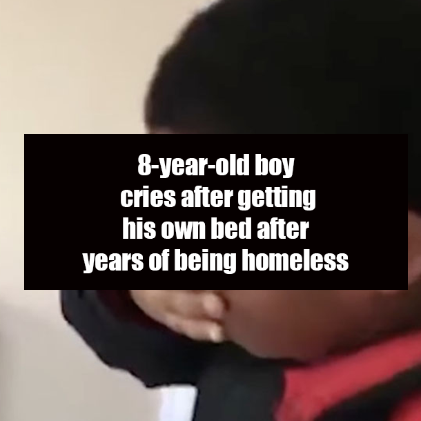 8-year-old boy cries after getting his own bed after years of being homeless