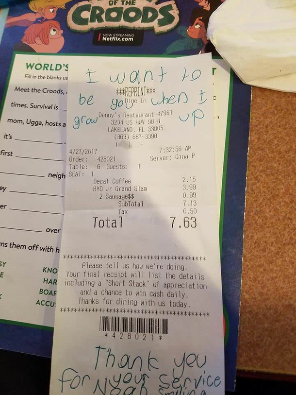 9-year-old boy hands cop a secret note. Reads the note and jumps out of his chair in shock. - picture 2