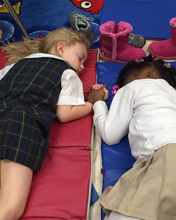 A Girl Is Sleeping On The Floor But Wait...Look At What She Is Holding In Her Hand...ADORABLE! - picture 2