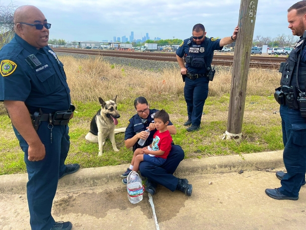A missing 5-year-old boy with Down syndrome is found with his protective dog keeping him safe - picture 2