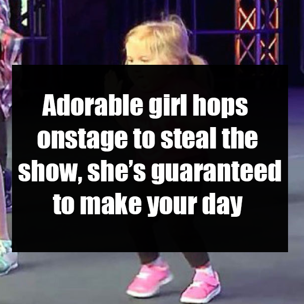 Adorable girl hops onstage to steal the show, she’s guaranteed to make your day