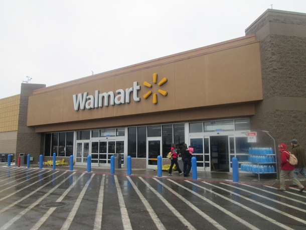 Boy Wanders Off While At Walmart With His Mother. Once Mom Finds Him Kneeling, She Looks At Blue Board Hung On Wall - picture 2