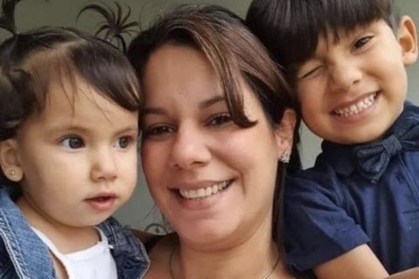 Children found holding on to their mother's lifeless body after she helped keep them alive for days at sea - picture 4