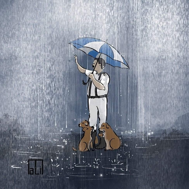 Cop goes viral for covering stray dogs with his umbrella during heavy rain - picture 4