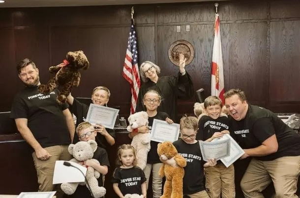 Couple adopts 6 siblings who were separated in foster care, keeps them together as a forever family - picture 4