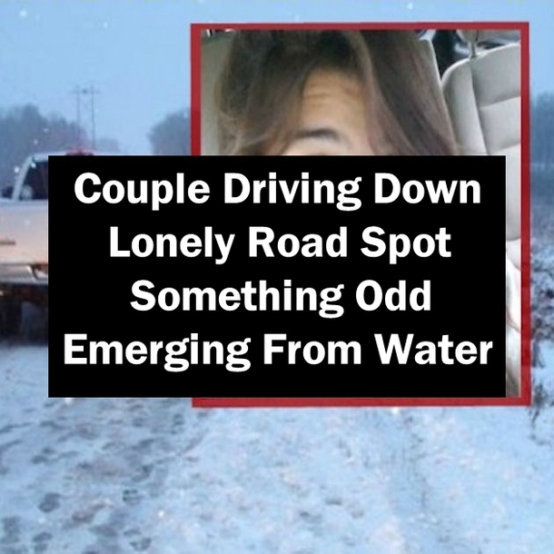 Couple Driving Down Lonely Road Spot Something Odd Emerging From Water