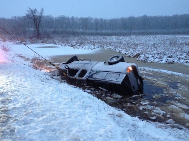 Couple Driving Down Lonely Road Spot Something Odd Emerging From Water - picture 3