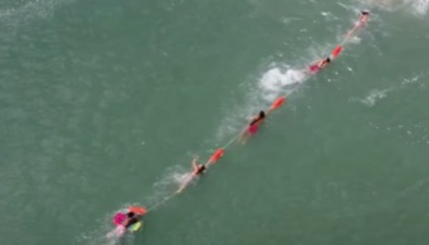 Drone Footage Witnesses Lifeguards At Work, Rescuing Boogie Boarder Back To Shore - picture 2
