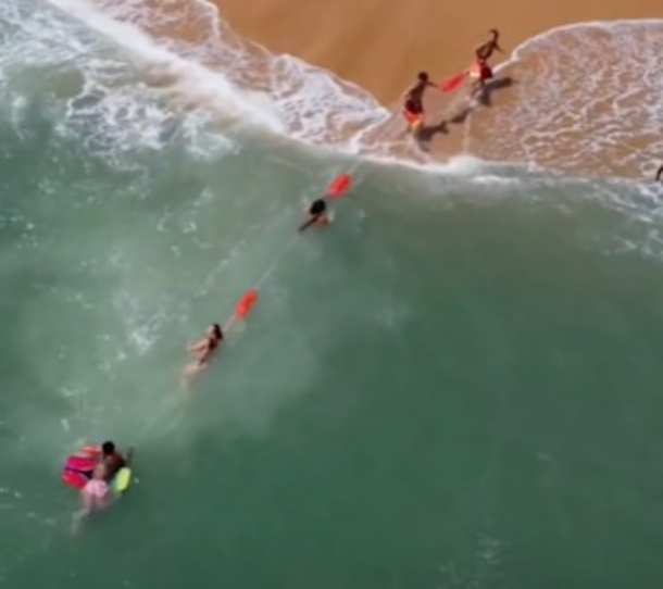 Drone Footage Witnesses Lifeguards At Work, Rescuing Boogie Boarder Back To Shore - picture 3