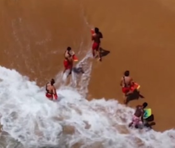 Drone Footage Witnesses Lifeguards At Work, Rescuing Boogie Boarder Back To Shore - picture 4