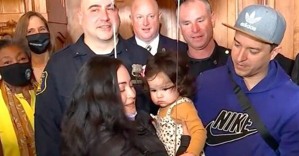 Family was reunited with Cops who pulled car off their infant daughter - picture 2