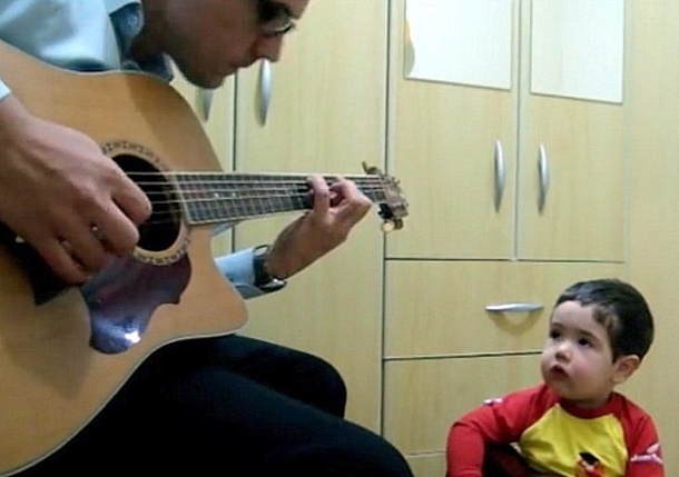 Father Plays Classic Beatles Song On Guitar, Looks Over At 1-Year-Old Who Opens His Mouth And Does Something Special - picture 2