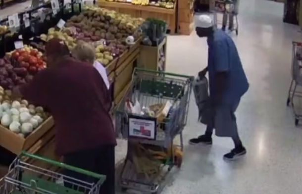 Footage From Supermarket Exposes Shocking  Moment As Man Creeps Up On Woman As Other Shoppers Look - picture 3