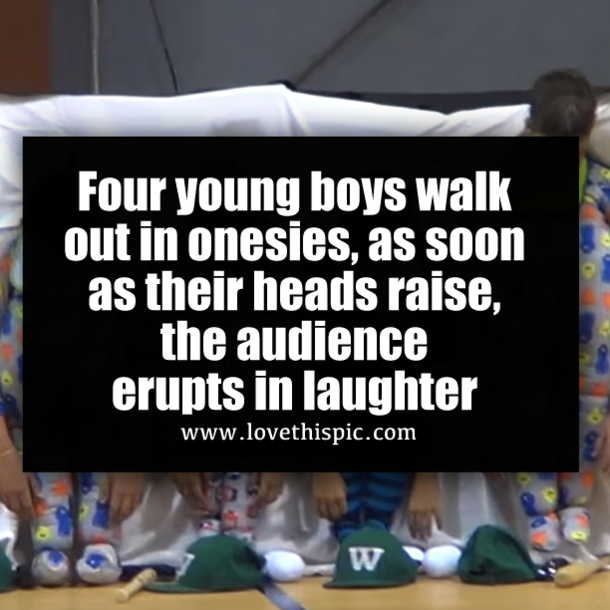 Four young boys walk out in onesies, as soon as their heads raise, the audience erupts in laughter