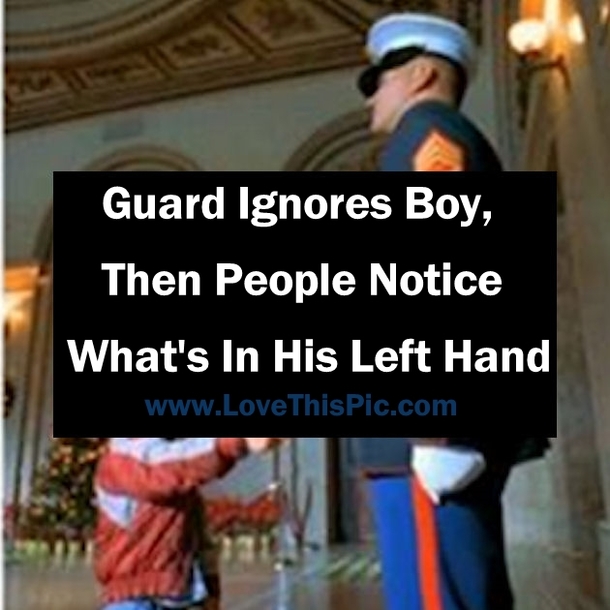 Guard Ignores Boy, Then People Notice What's In His Left Hand