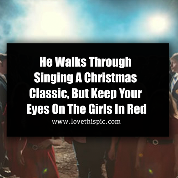 He Walks Through Singing A Christmas Classic, But Keep Your Eyes On The Girls In Red