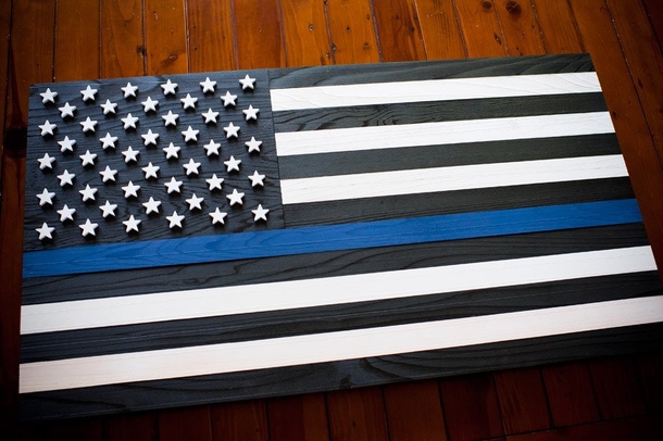 Here's What The Blue, Black And White Striped Flag Means - picture 3