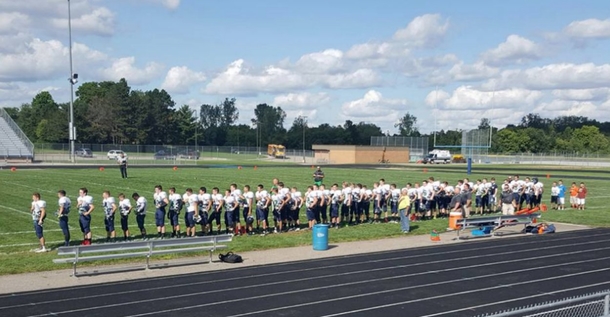High School Football Players Shock Crowd After They Line Up For National Anthem - picture 2