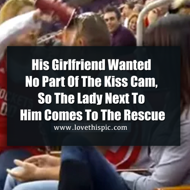 His Girlfriend Wanted No Part Of The Kiss Cam, So The Lady Next To Him Comes To The Rescue
