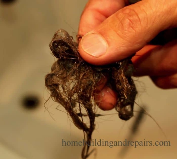 How To Repair A Bathtub Drain Clogged By Hair - picture 3