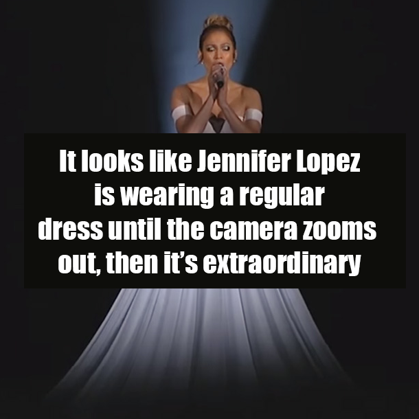 It looks like Jennifer Lopez is wearing a regular dress until the camera zooms out, then it’s extraordinary