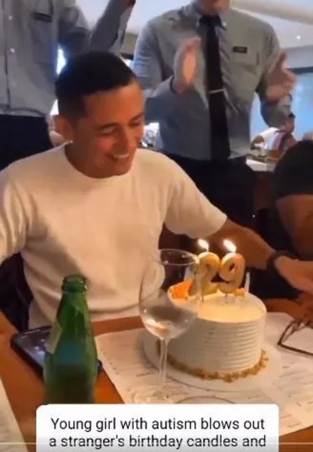 Kid with autism attempts to blow stranger’s birthday cake, the celebrant lets her do the honors with joy - picture 2