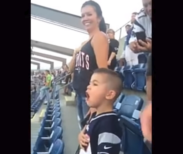 Little Boy Hears National Anthem, Suddenly Stands And Sings Song That Captures Crowd In Seconds - picture 2