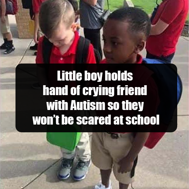 Little boy holds hand of crying friend with Autism so they won’t be scared at school