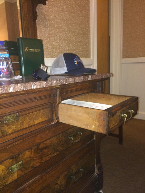 Man Discovers Hidden Button In Hotel Dresser, So He Decides To Push It - picture 3