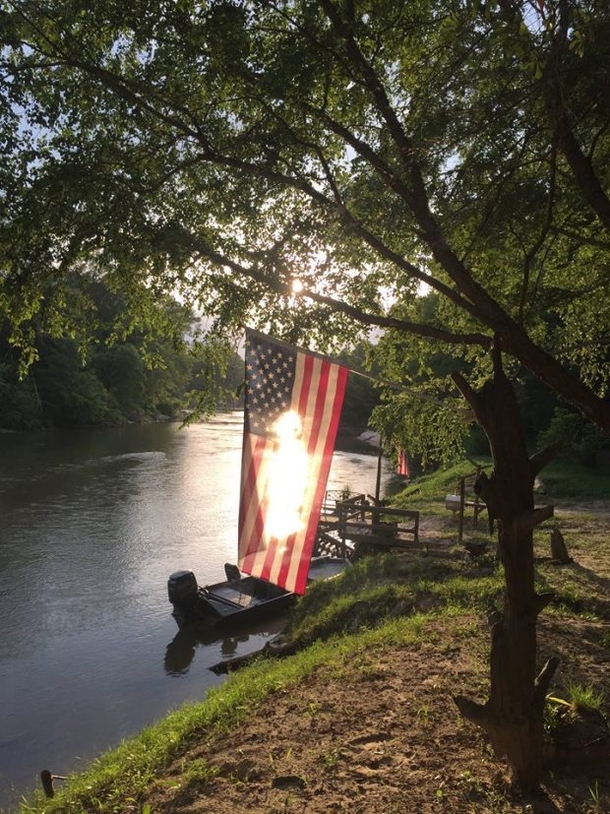 Man Snaps Scenic Pic At River, Shocked By What He Caught Behind The Flag - picture 3
